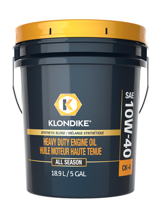 A 5-gallon pail of Klondike 10W-40 heavy-duty synthetic blend engine oil with a yellow lid and labeled for all-season use.